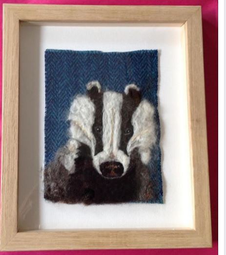 ‪An amazing needle felted badger on Harris Tweed