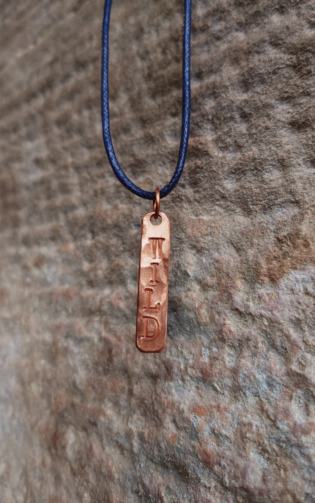 Copper offers forged pendant